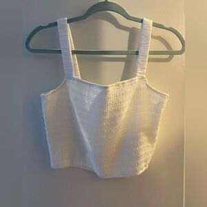 And now this crop white tank top